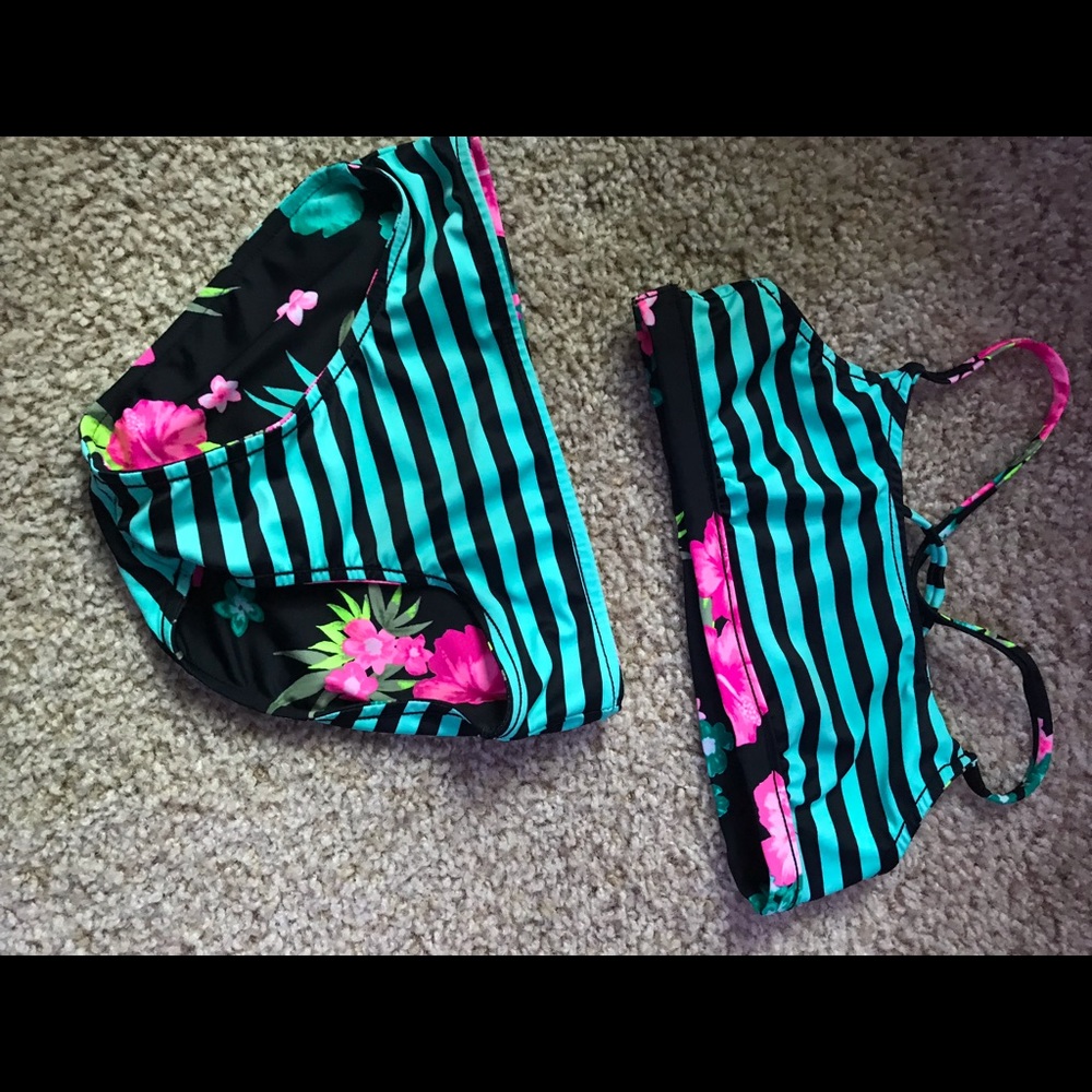 Justice bathing suit. It’s 2 sided./ reversed